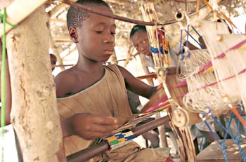 Boy weaving